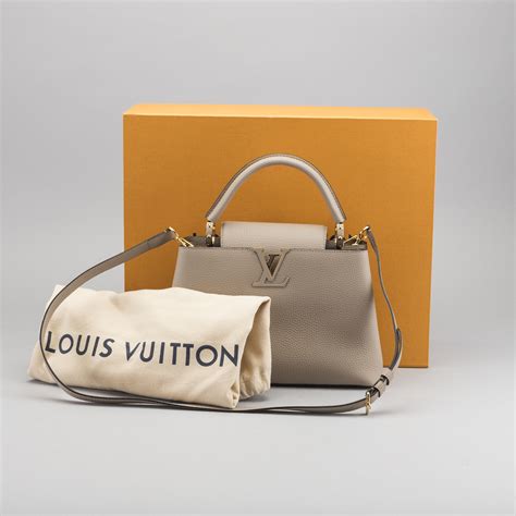 louis vuitton capucines resale value|louis vuitton repackaged bags.